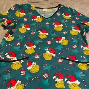 Women’s used scrub top med